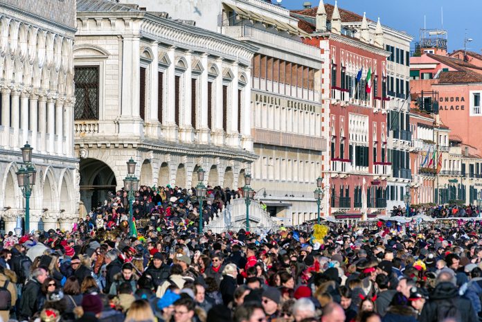 Overcrowded Venice during carnival 2018, Italy digit almaviva