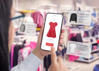 Utilizzo di private AI nel retail: Negozio di abbigliamento tramite un'app per smartphone con palloncini intorno che suggeriscono consigli sull'abbigliamento