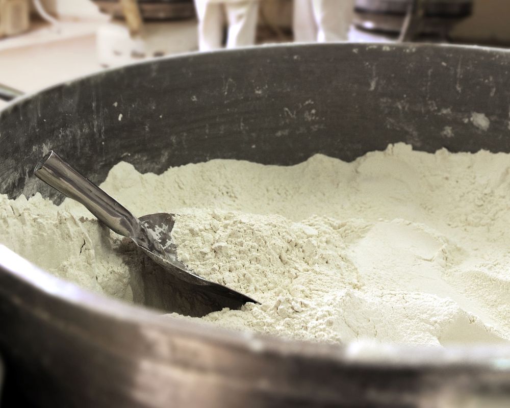 Bread factory surveillance, wheat and two workers