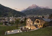 Casa Lago Dolomiti: abitare il paesaggio e aprirsi all’incontro
