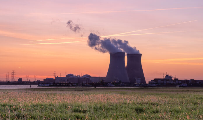 Sunset over the nuclear reactor of Doel in the Port of Antwerp,