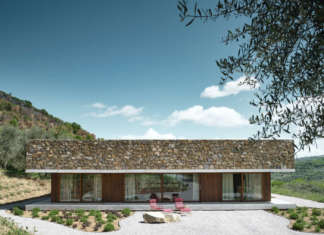 Una moderna casa a patio sulle colline toscane