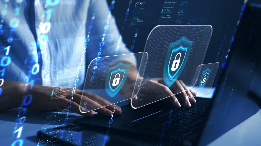 Cybsersecurity-industriale-survey-2025-teamsystem-AdobeStock_528502694-2-scaled.j Cyber security firewall interface protection concept.Personal data security and banking. Protecting herself from cyber attacks.