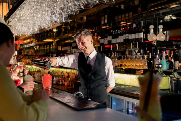 Bartender Pouring a Cocktail Bartender Pouring a Cocktail