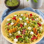 Fregola con primo sale, albicocche grigliate e peperoni