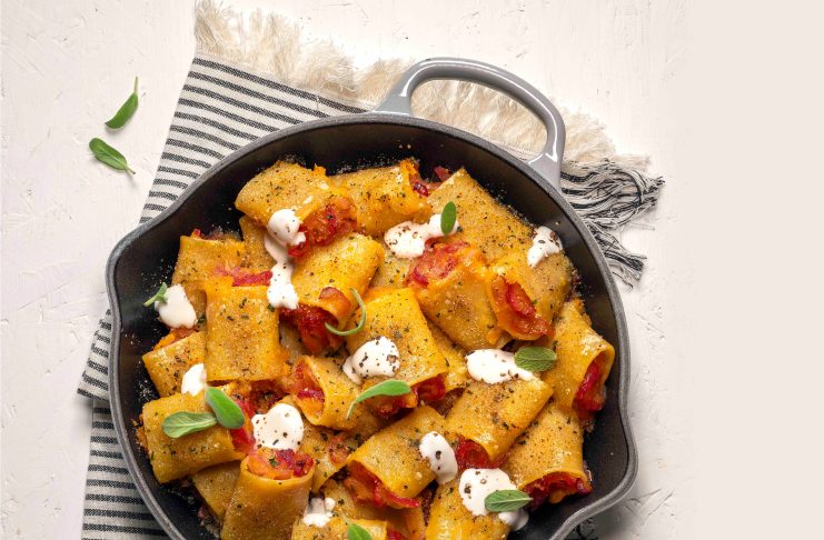 Paccheri gratinati con cipolle caramellate, zucca e fonduta