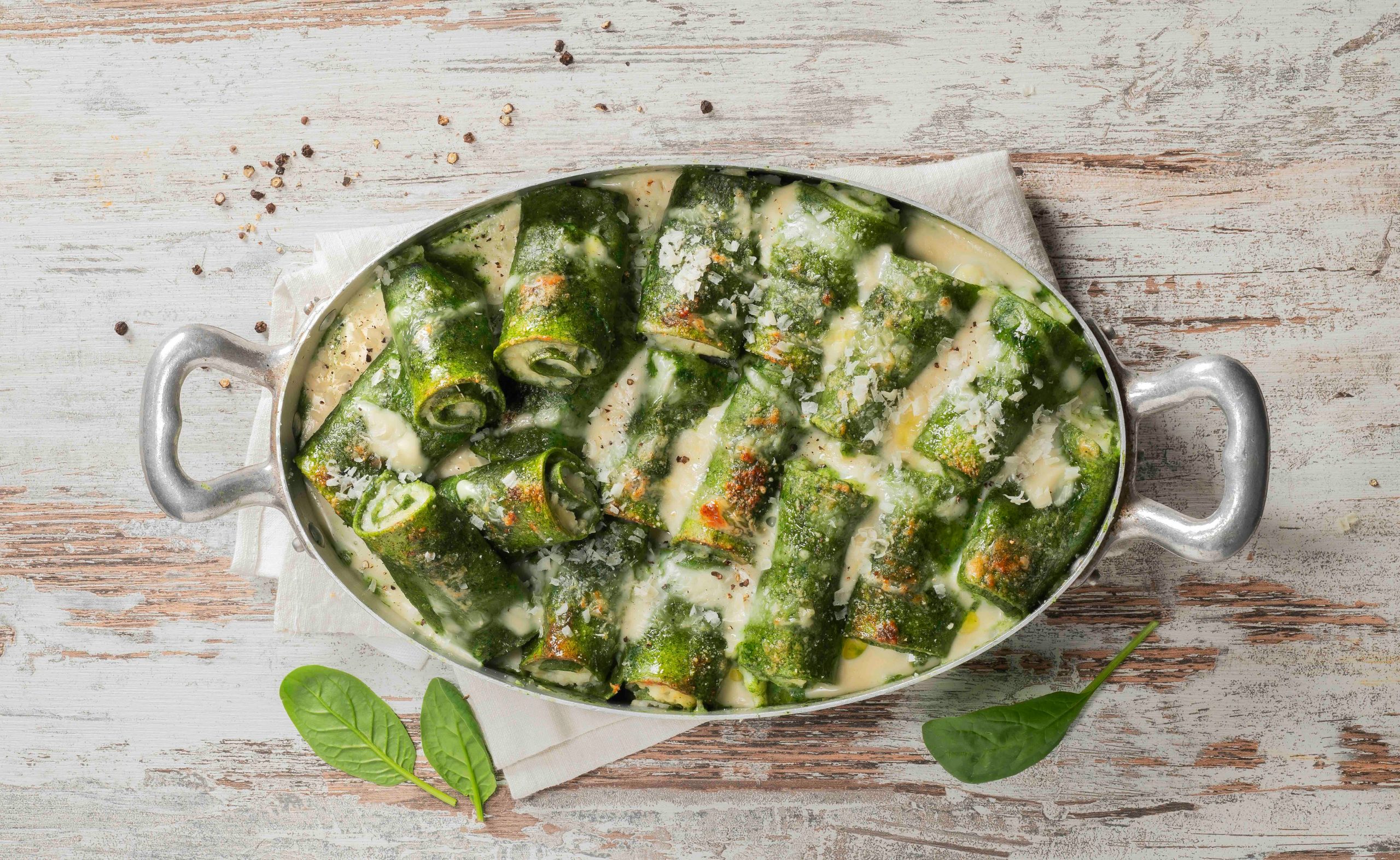 Mezzi cannelloni spinaci e cavolfiore in besciamella alla crescenza