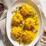 Ravioli di pere e taleggio allo zafferano con pepe di Sichuan