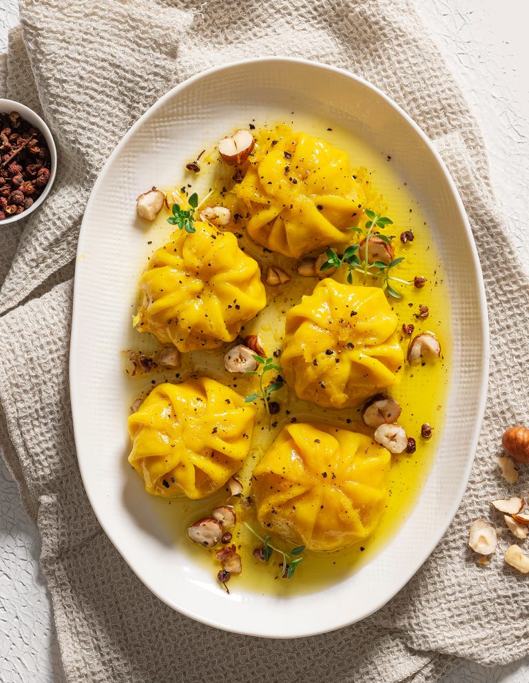 Ravioli di pere e taleggio allo zafferano con pepe di Sichuan
