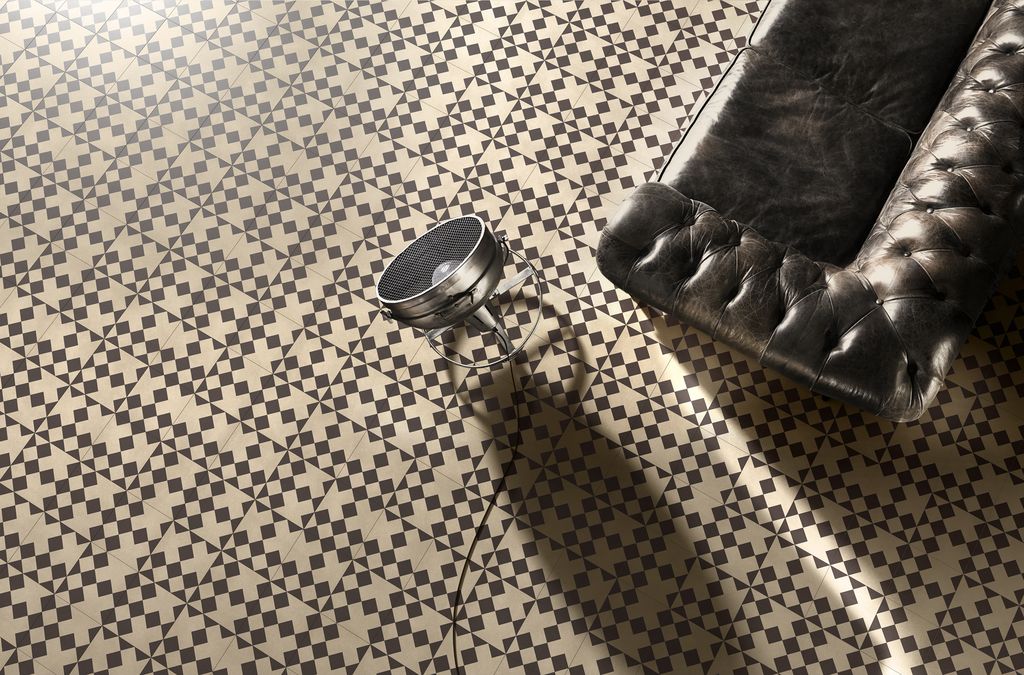 Le serie di piastrelle in cemento per pavimenti e pareti disegnate da India Mahdavi per la collezione Contemporary Cement Tiles di Bisazza propone motivi grafici optical declinati in accostamenti cromatici raffinati. Nella foto, la serie Dot Design (foto Bisazza)