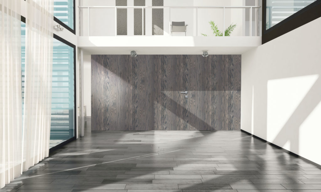 Porta Blindata Sleek di Dierre con rivestimento in rovero grigio scuro. 