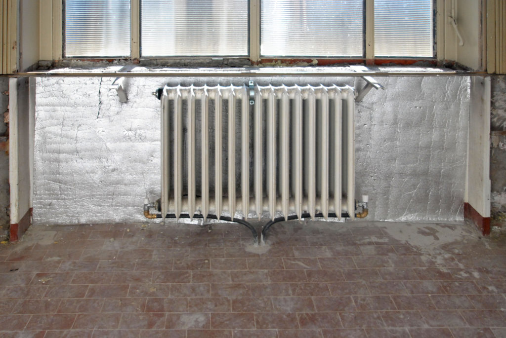 Il recupero dei radiatori e isolamento della parete.