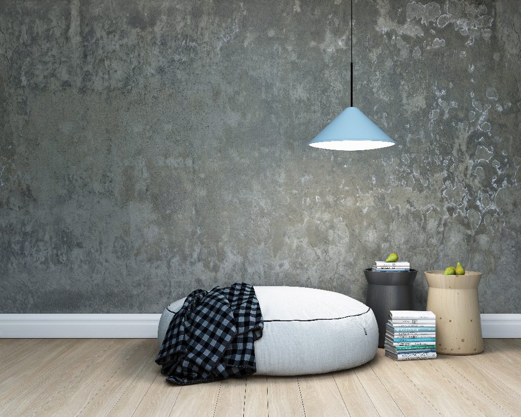 Nell’immagine, ambiente living con parete realizzata con la collezione Resina Materia di Elekta, effetto Redoxy degradato alluminio e ghisa. Finitura trasparente opaco. (foto Elekta Painting)