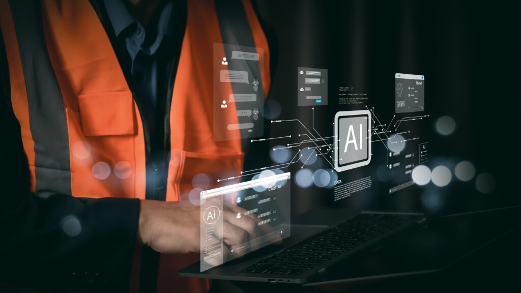 Tecnico con gilet di sicurezza che utilizza un laptop con interfacce di intelligenza artificiale per l'automazione dei processi amministrativi e la riconciliazione bancaria