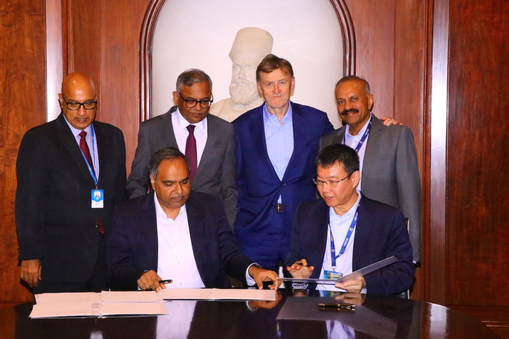 Caption for logo: Tata and Analog Devices announce strategic alliance to explore joint opportunities for semiconductor ecosystem in India Caption for photo: MoU signing ceremony as Tata and Analog Devices announce a strategic alliance to explore joint opportunities for the semiconductor ecosystem in India. Names/Titles of people in MoU photo: • Standing (left to right): Dr. Randhir Thakur (CEO and Managing Director, Tata Electronics), N Chandrasekaran (Chairman of Tata Sons), Vincent Roche (CEO and Chair at ADI), Vivek Jain (Executive Vice President, Global Operations and Technology at ADI) • Sitting (left to right): Shailesh Chandra (Managing Director, Tata Motors Passenger Vehicles Limited and Tata Passenger Electric Mobility Limited), Jerry Fan (Senior Vice President, APJC Sales President, ADI Asia Pacific)