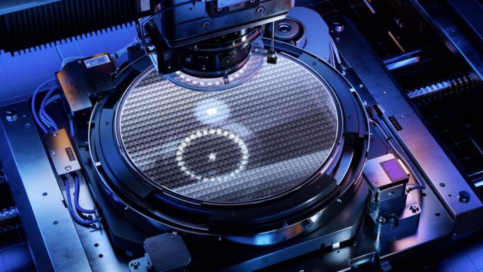 Silicon Wafer during Photolithography Process inside Complex Computer Chip Production Machine. Semiconductor Manufacturing at Modern Fab or Foundry. sell-off