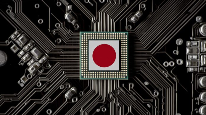 a close-up of an electronic chip with the japan flag on it, placed in the center of a circuit board. Rapidus