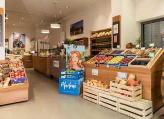 Vog, esposizione di mele Marlene in un punto di vendita