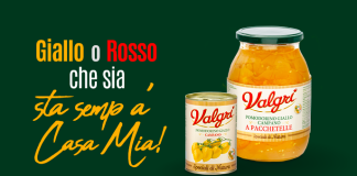 Conserve Valgrì di Pomodorino Giallo Campano intero e a pacchetelle, accompagnate dallo slogan 'Giallo o Rosso che sia, sta semp' a Casa Mia!' su sfondo verde scuro.