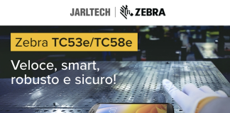 Mobile computer Zebra TC53e/TC58e su superficie industriale metallica, con guanto da lavoro in primo piano; slogan “Veloce, smart, robusto e sicuro!” e loghi Jarltech e Zebra in alto.