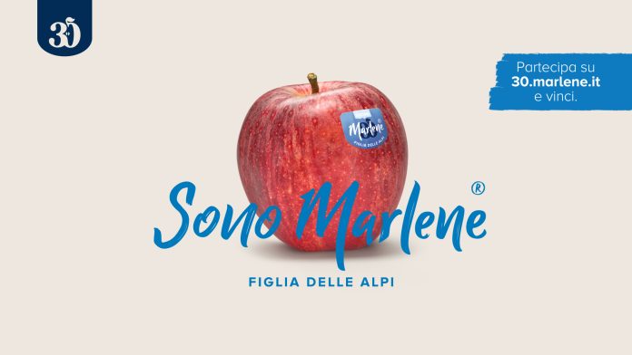 Mela Marlene® con logo e scritta ‘Sono Marlene, figlia delle Alpi’, immagine della campagna Marlene® festeggia 30 anni e invita a partecipare al concorso su 30.marlene.it