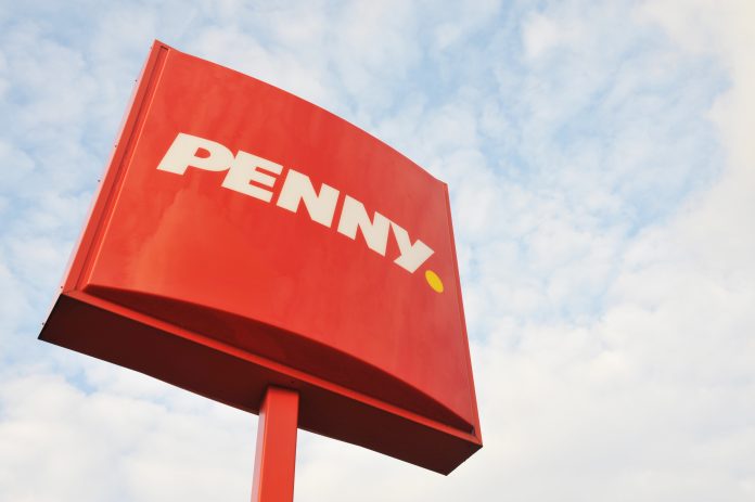 Paderborn, North Rhine-Westphalia / Germany - October 3, 2016: Sign with the Logo of Penny Market in Paderborn, Germany - Penny is a discount supermarket chain based in Germany Penny Rewe