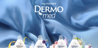 Gamma di ammorbidenti concentrati Dermomed in varie profumazioni floreali su sfondo di seta azzurra