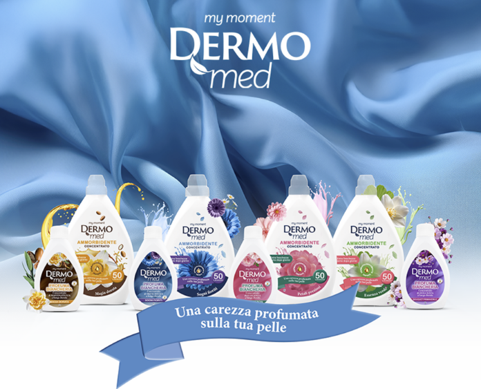 Gamma di ammorbidenti concentrati Dermomed in varie profumazioni floreali su sfondo di seta azzurra