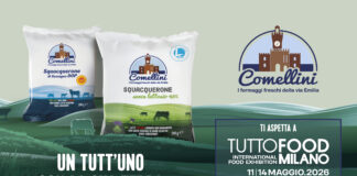 Banner promozionale del Caseificio Comellini a Tuttofood 2026. L'immagine mostra due confezioni di formaggio Squacquerone, la versione classica DOP e la variante senza lattosio con caglio vegetale, su un'illustrazione paesaggistica che include mucche e cardi. A destra, il logo aziendale e i dettagli dell'evento: Tuttofood Milano, 11-14 maggio 2026, Padiglione 3 - Stand F10, con lo slogan "Un tutt'uno con la sua terra"