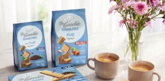 • Confezioni di wafer Lago Group Be-Goodie Sugar Free in vari formati esposte a Tutto-food 2026 con tazze di caffè su un tavolo