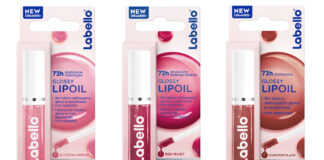 Gamma completa dei nuovi Labello Lip Oil: confezioni e flaconi delle tre shade Blossom Breeze, Red Velvet e Maroon Glaze, arricchite con ceramidi e boost di collagene per 72 ore di idratazione e brillantezza