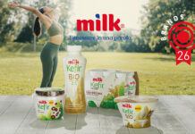 Milk Kefir conquista il primo posto ai Brands Award 2026 Prodotti della gamma Milk Kefir da bere e al cucchiaio di Latteria Nöm in un parco con il bollino del premio Brands Award 2026 e una donna che fa stretching