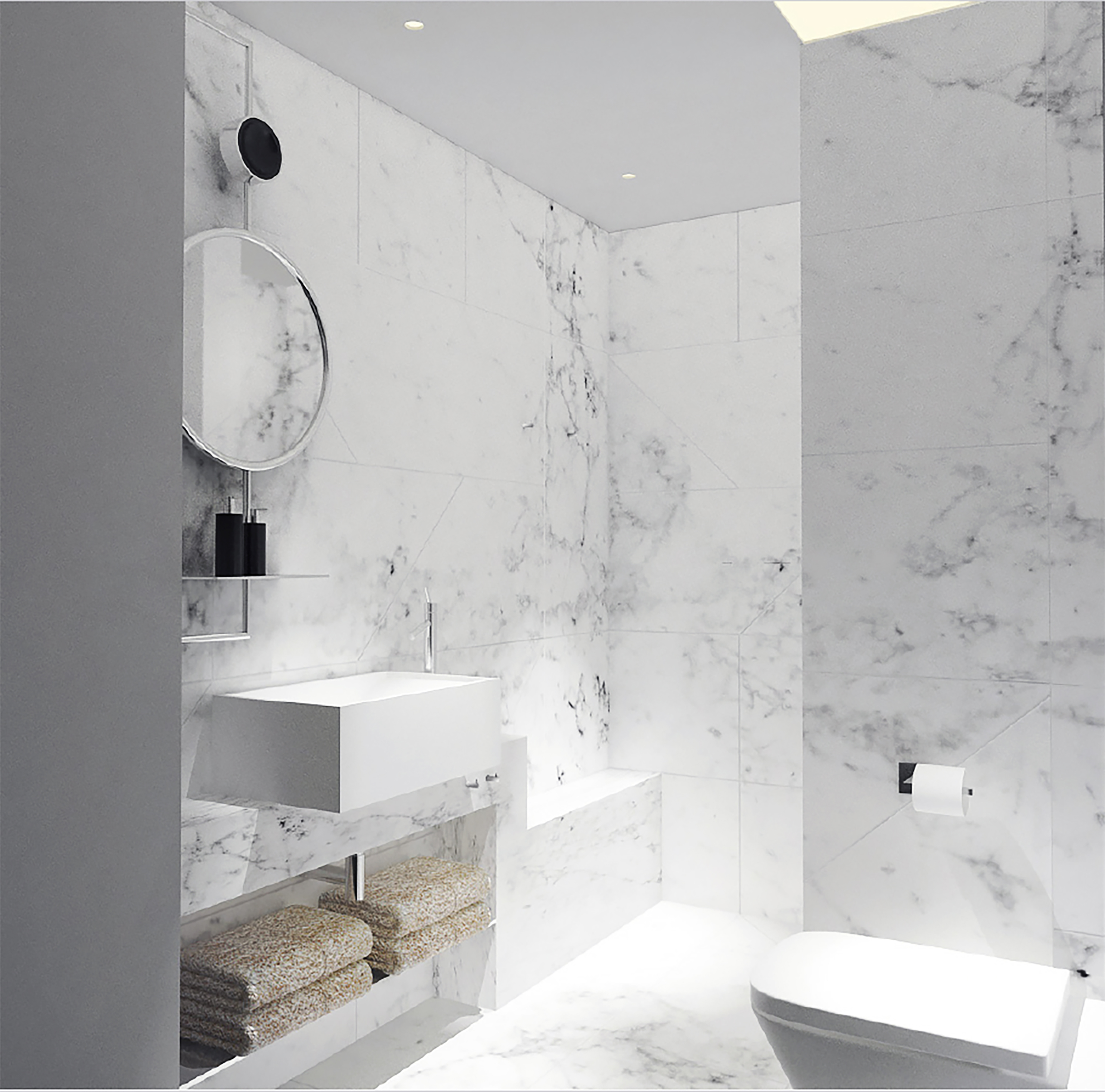 un bagno rivestito in marmo bianco