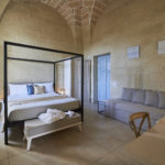 Relais Masseria Le Cesine camera con letto a baldacchino