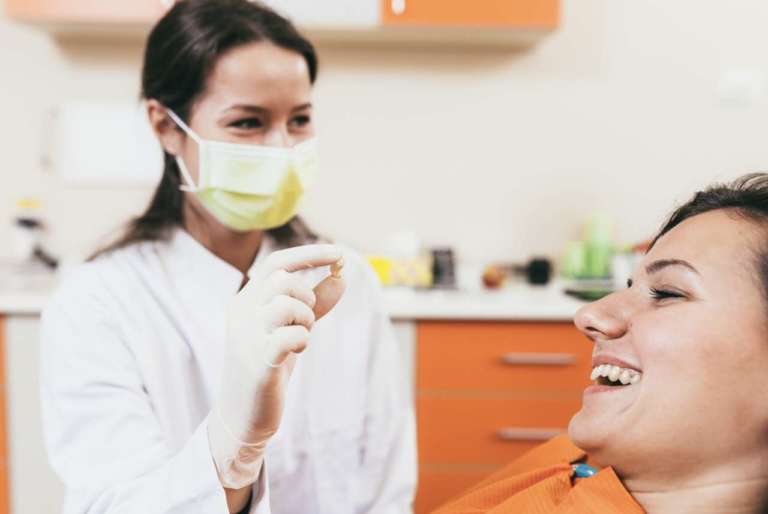 Estrazione del terzo molare e fotobiomodulazione per ridurre il dolore