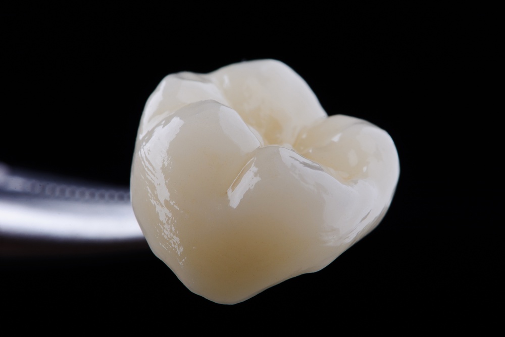 High-quality,Zirconia,Dental,Crown,On,Black,Background.,Dental,Ceramic,Crown Zirconia