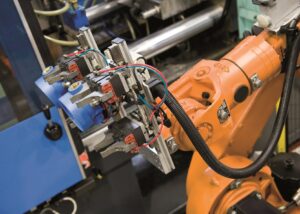 Robot antropomorfo per la produzione di testate