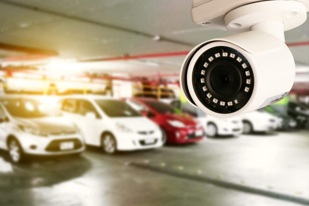 Security CCTV camera in office building installed indoor car park - ph credits: AdobeStock
