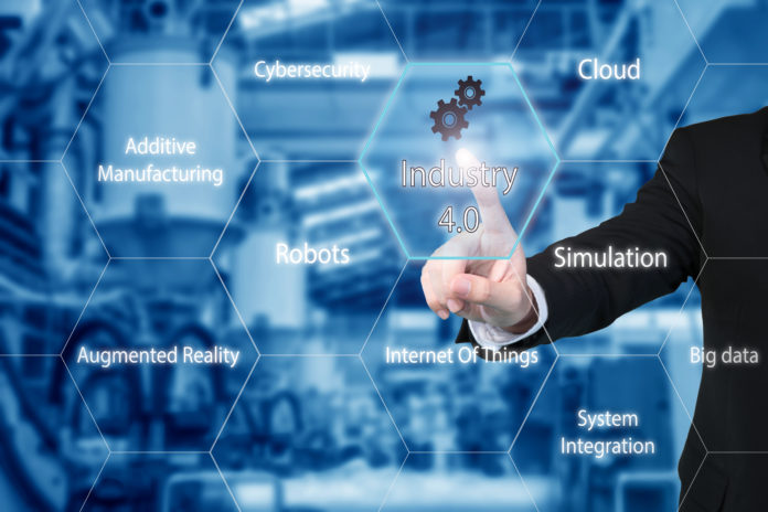 Business man touching industry 4.0 icon in virtual interface scr