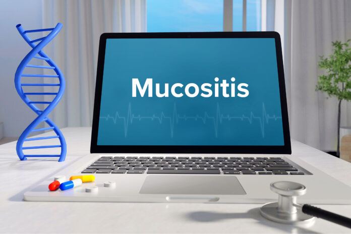 Mucositis – Medicine/health. Computer in the office with term