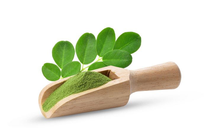 Moringa,Leaf,With,Powder,In,Scoop,Isolated,On,White,Background