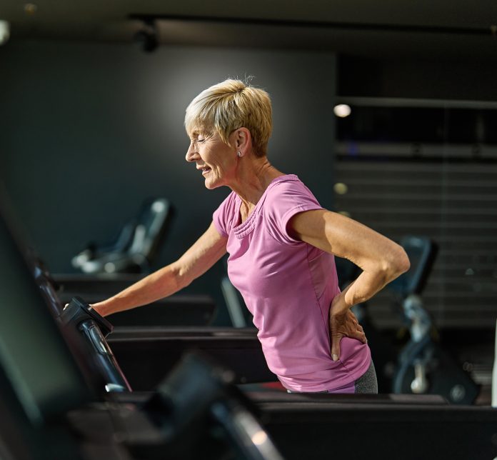 Portrait,Of,A,Senior,Elderly,Woman,Exercising,In,A,Gym,