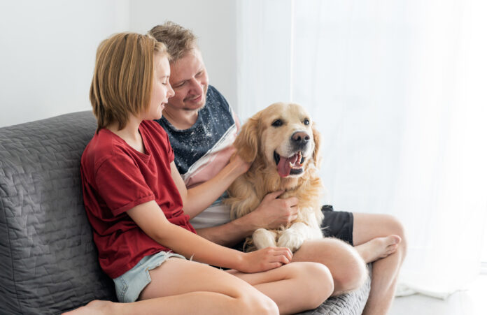 Happy Family of Dad And Little Daughter Pet Golden Retriever Dog Mars