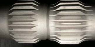 Fretting wear damage in crowned splined couplings