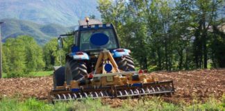 Analysis of the kinematic chain for the motion transmission from the tractor to a rotary harrow