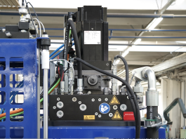 Hybrid actuation for more compact and high-performance testing machines