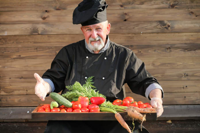 Farmer with a basket of fresh vegetables