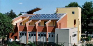 5 portoni in 5 configurazioni per nuova sede Consorzio ad emissioni 0