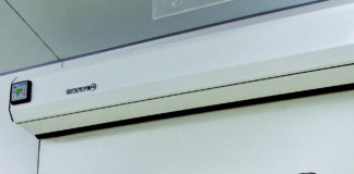 TÜV certifica tenuta porte automatiche Manusa per sale di radiologia