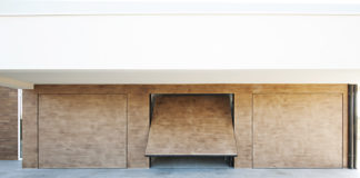 Bellezza della forma-funzione. La porta da garage diventa… Invisible